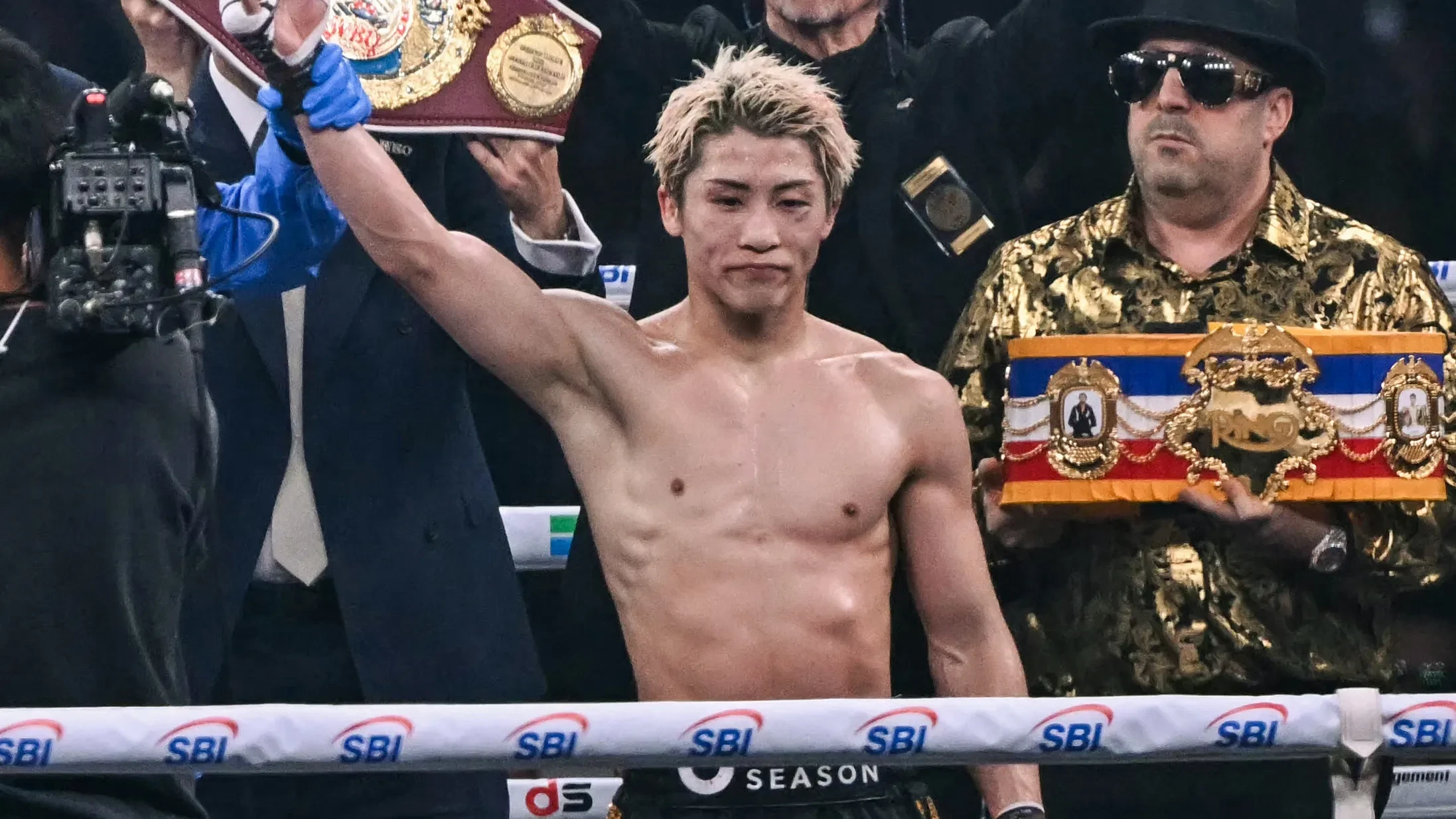 Naoya Inoue survives Junto Nakatani challenge to keep undisputed featherweight crown